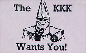 The Klan passes out leaflets with different kind of messages.